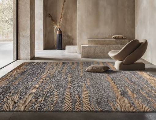 Close-up of a Dubai carpet sample being fitted to a room corner