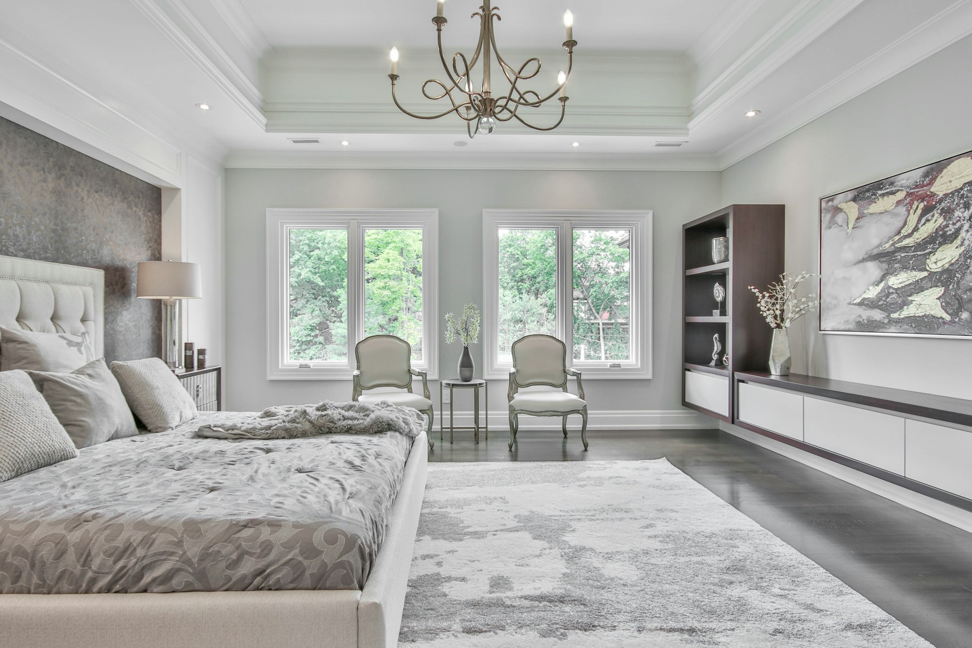 Thick cream shaggy rug beside a bed in a modern Dubai bedroom