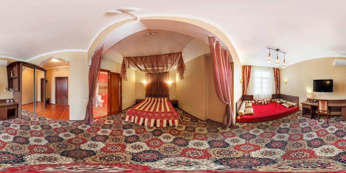 Patterned wall-to-wall carpet fitted in a Dubai majlis-style room